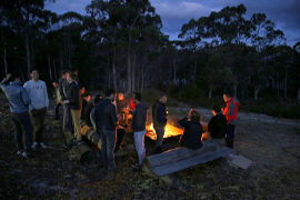 Relaxing by the outside fire at Bruny Island Lodge
